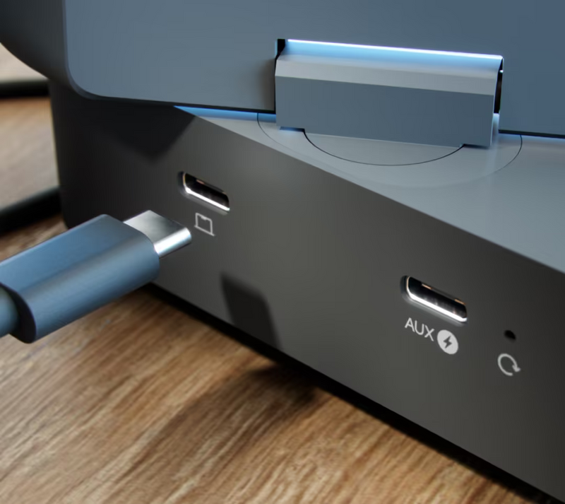 Ubiquiti U-AirWire UniFi AirWire with a USB-C plug aligned with the main port beside the AUX power port and reset button