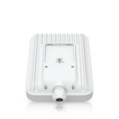 Ubiquiti U5G-Max-Outdoor UniFi 5G Max Outdoor tilted rear view showing the screw-secured connection cover and cable entry gland.