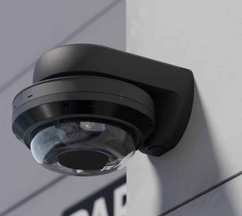 Ubiquiti UACC-AI-MS-4-AM-B UniFi AI Multi Sensor 4 black camera arm mount installed on a wall with an attached dome camera, viewed from below.