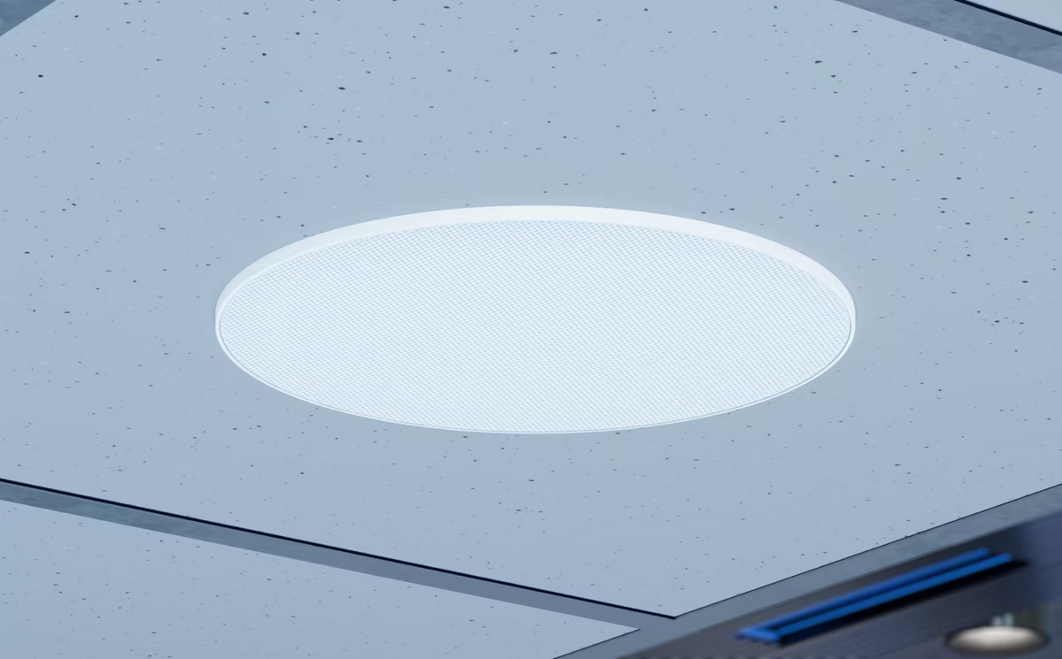 Ubiquiti UACC-In-Ceiling-Speaker UniFi In-Ceiling Speaker installed flush in a ceiling with low-profile circular grille