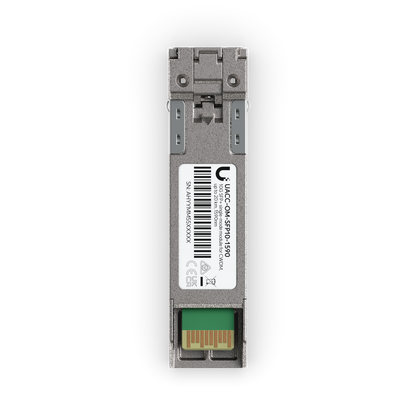 Ubiquiti UACC-OM-SFP10-1590 UniFi 10G CWDM single-mode optical module top view with 1590 nm label, barcode and gold contacts