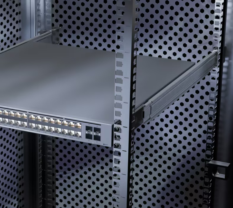 Side view of UniFi Sliding Rack Rails mounted in a server cabinet with a rackmount network switch extended forward