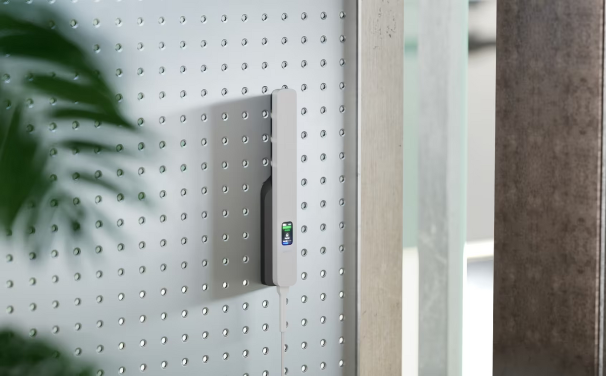 Ubiquiti U5G UniFi 5G Backup mounted on a perforated metal panel beside a window