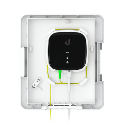Open UISP Fiber Outdoor Terminal Box configured with a larger fibre device, optical cable guides and connection leads