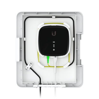Ubiquiti UACC-UF-Terminal-Box open with fibre device, yellow optical cable and black cable routed around the enclosure