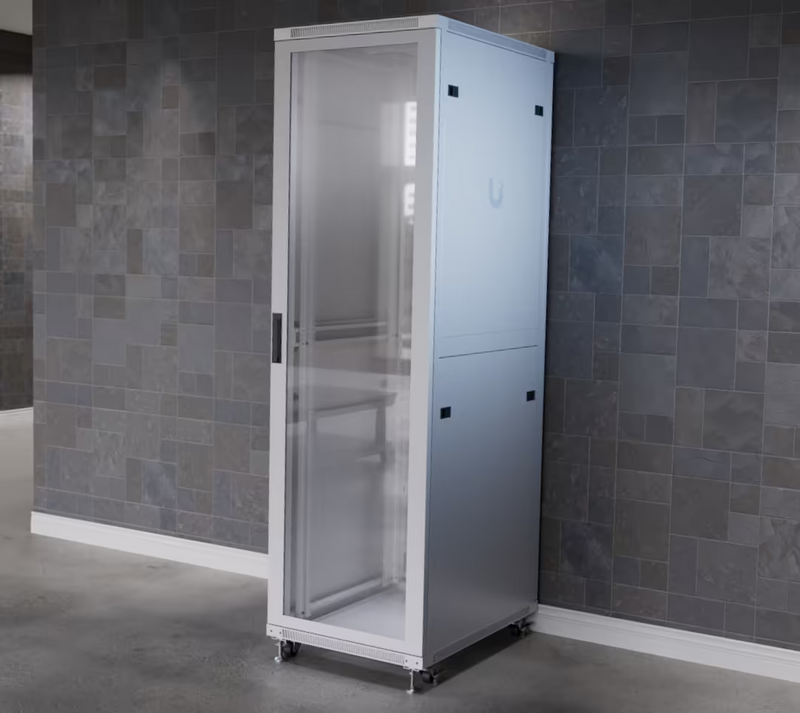 Ubiquiti UACC-Rack-42U-800-G UniFi 800mm 42U Rack Cabinet installed with tempered glass front door, solid side panels and casters