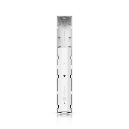 Open battery compartment of the Ubiquiti USL-GlassBreak sensor showing the spring contact and device label