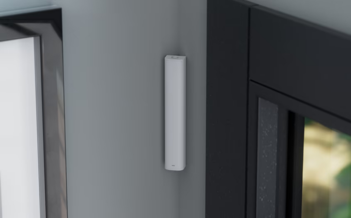 Ubiquiti USL-GlassBreak UniFi Glass Break Sensor mounted beside a window in a modern interior