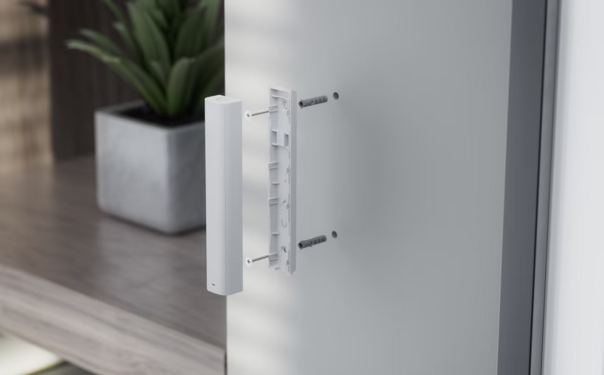 Ubiquiti UniFi Glass Break Sensor exploded view showing wall mount, screws and anchors