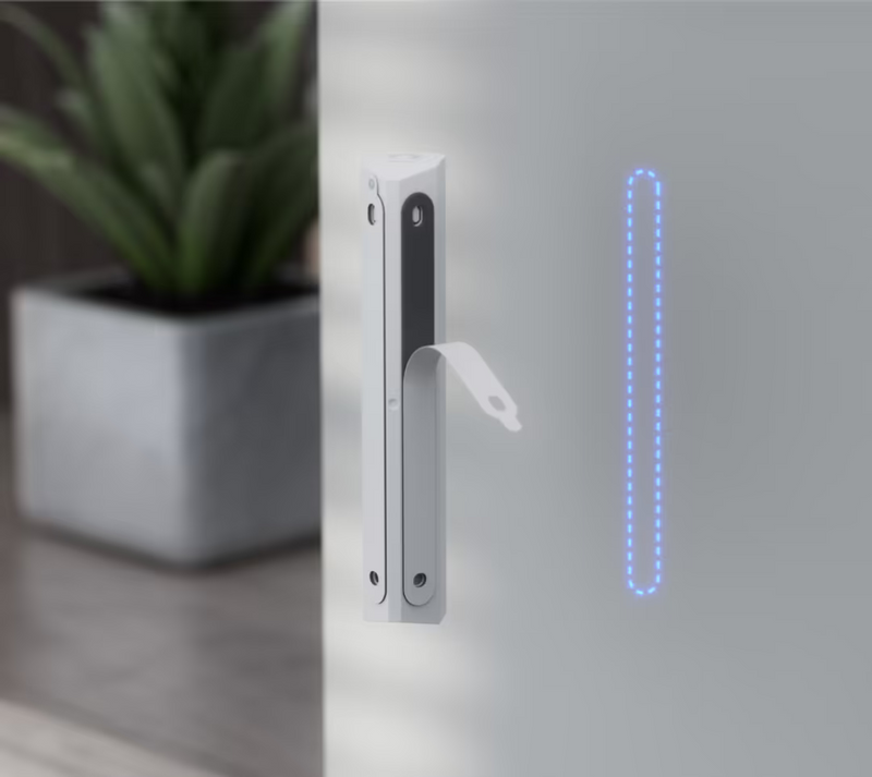 Ubiquiti USL-GlassBreak with protective film peeling from the adhesive wall-mounting strips