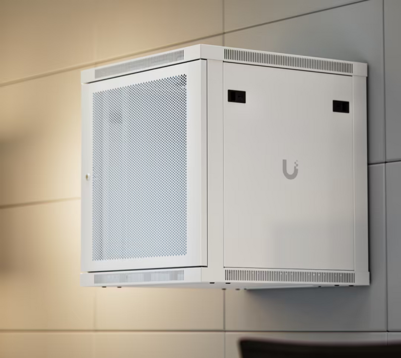 Ubiquiti UACC-Rack-12U-Wall-600-P UniFi 12U Rack Cabinet angled wall-mounted installation with perforated door, solid side panel and ventilation slots