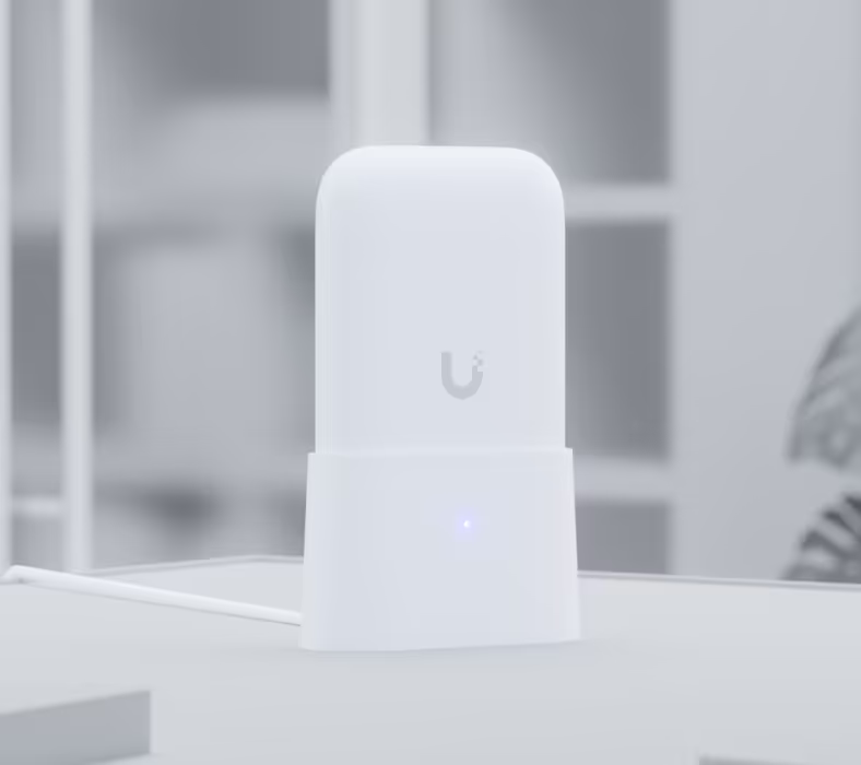 UniFi Swiss Army Knife Ultra access point mounted upright in the UACC-UK-Ultra-TS tabletop stand
