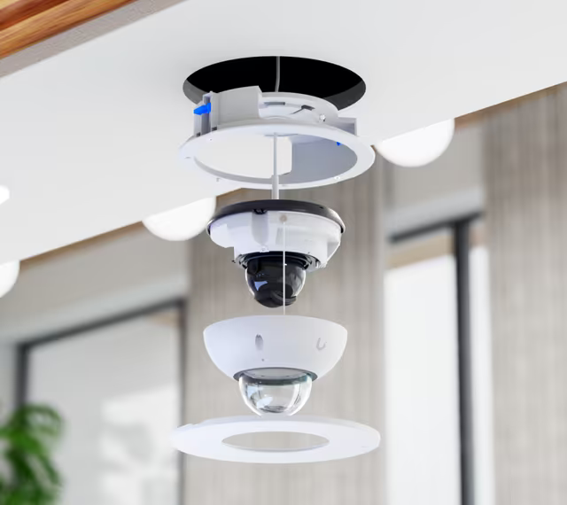 Exploded installation view of a UniFi G6 Dome camera and Ubiquiti UACC-G6-Dome-FM-W ceiling flush mount