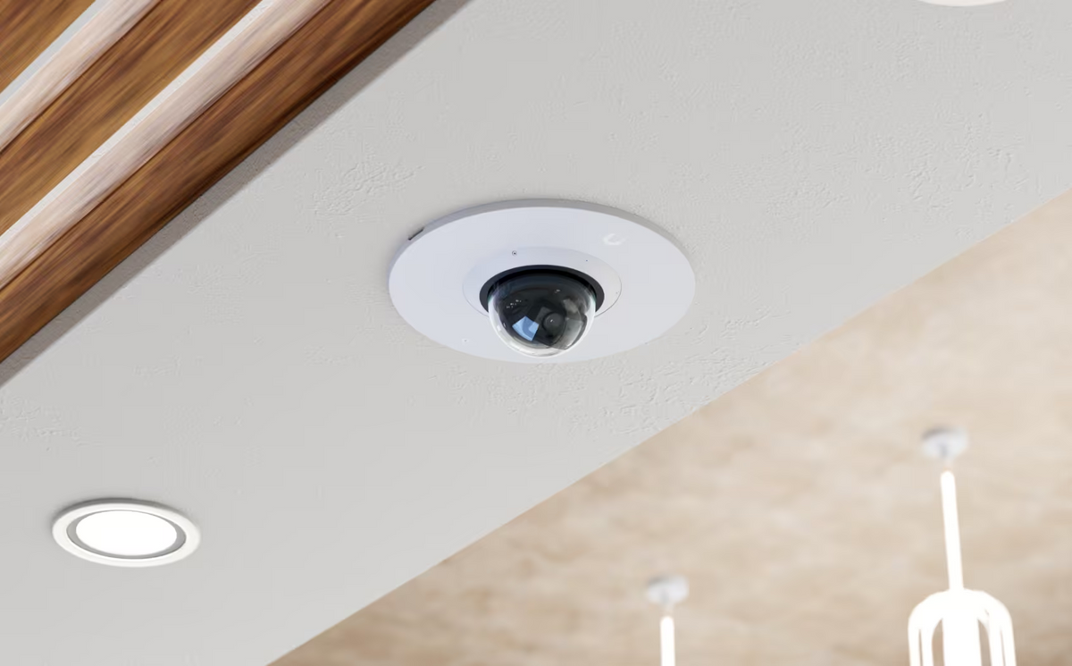 UniFi G6 Dome camera installed in a ceiling using the white Ubiquiti UACC-G6-Dome-FM-W flush mount