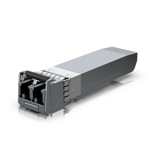 Ubiquiti UACC-OM-MM-10G-D UniFi 10G Multi-Mode Optical Module, angled underside view showing metal housing and duplex LC ports.