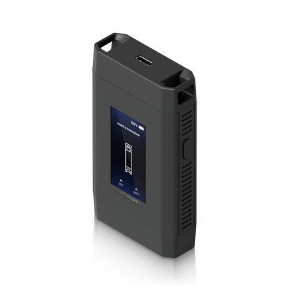 Angled top view of the UniFi SFP Wizard showing its display, USB-C port, side power button and textured housing