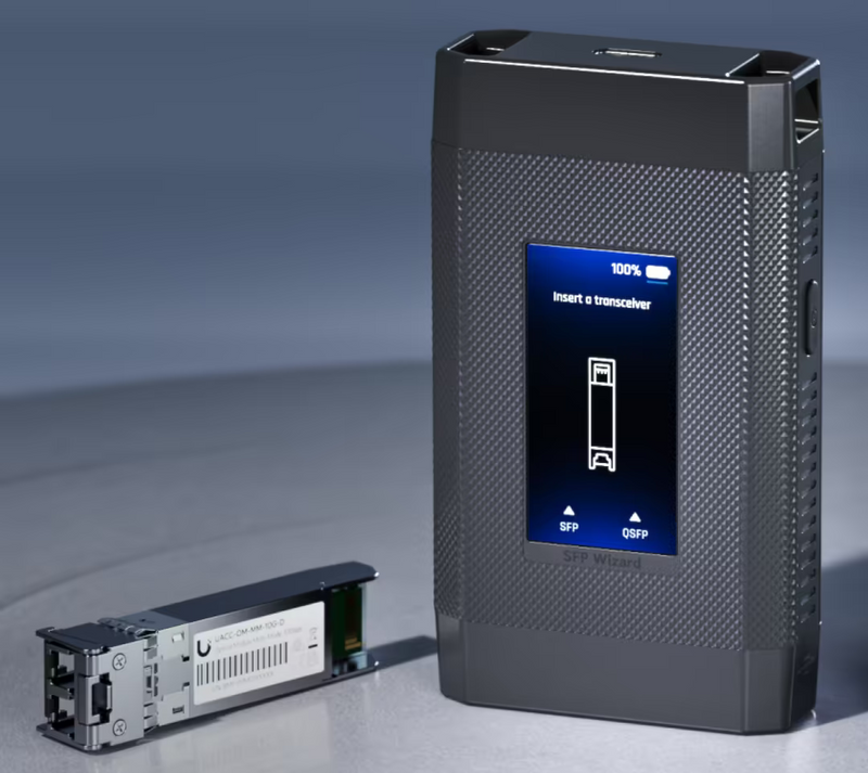 Ubiquiti UACC-SFP-Wizard UniFi SFP Wizard standing beside a compatible optical transceiver module