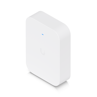 Ubiquiti U7 Pro XG Wall fitted with a white paintable cover, angled view with blue status LED