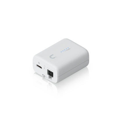 Angled underside view of the Ubiquiti UDB-IoT Device Bridge IoT with USB-C port, reset button and power socket