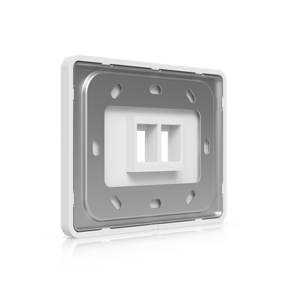 Angled rear view of Ubiquiti UniFi 2-port keystone wall plate with mounting frame and dual openings