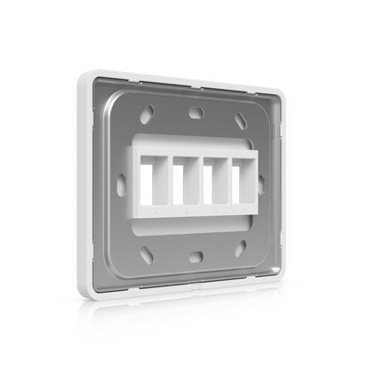Rear angled view of the UniFi paintable 4-port keystone wall plate with mounting plate and fixing slots