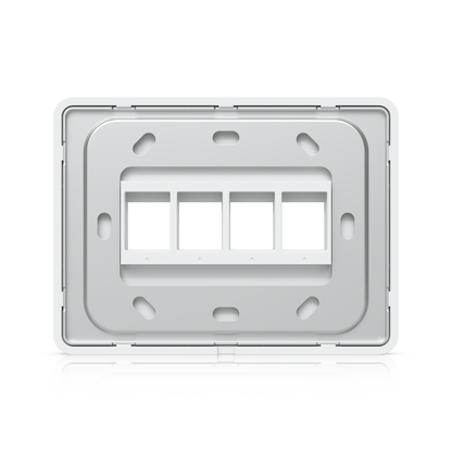 Rear view of the Ubiquiti UACC-WP-Keystone wall plate showing four module openings and mounting points