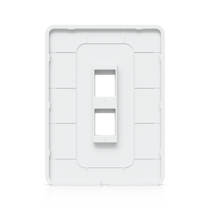 Back view of the Ubiquiti UniFi paintable wall plate showing the housing structure and two vertical keystone mounts