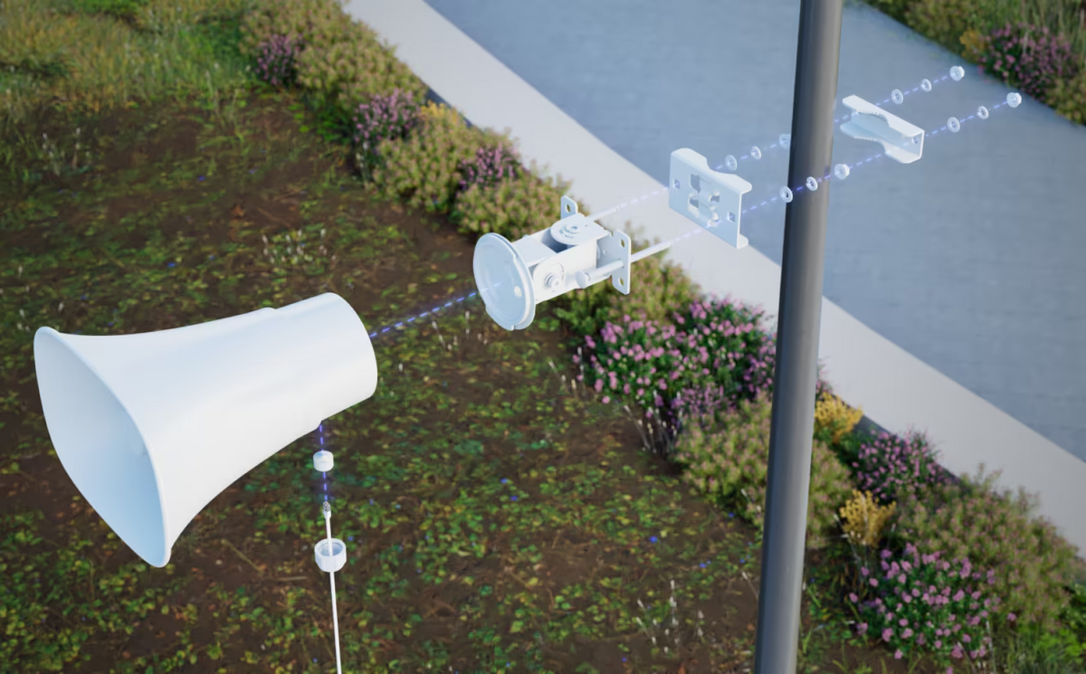Exploded outdoor pole-mount installation of the white Ubiquiti UniFi AI Horn Speaker