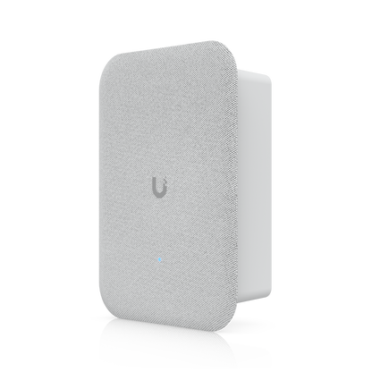 Three-quarter front view of the Ubiquiti UniFi AI Speaker UP-AI-Speaker with fabric grille and compact enclosure