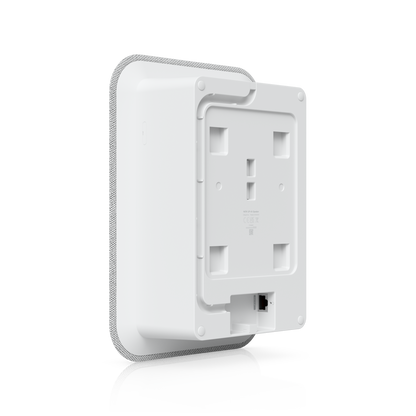 Rear angled view of the Ubiquiti UniFi AI Speaker with mounting plate and RJ45 PoE++ network port