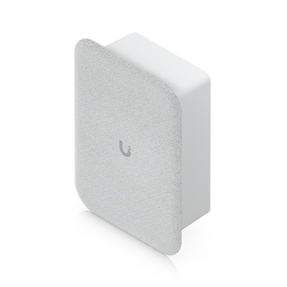 Elevated front view of the Ubiquiti UniFi AI Speaker featuring its rounded fabric grille and compact housing