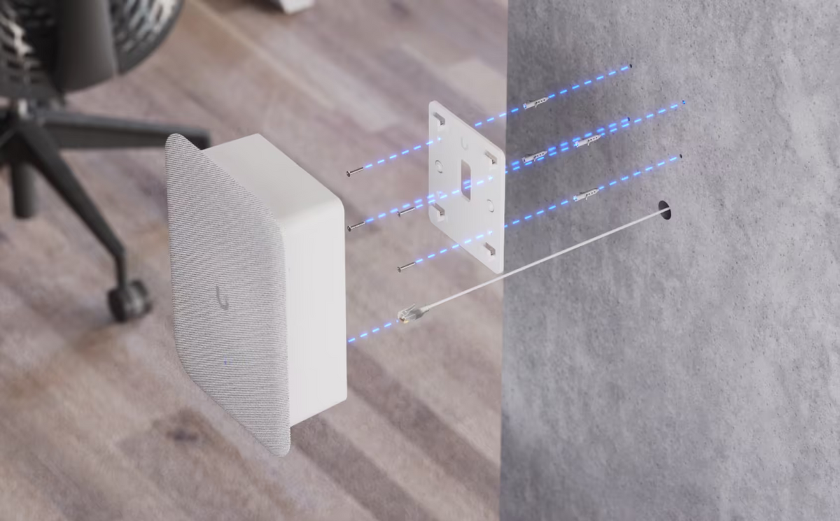 Exploded installation view of the UniFi AI Speaker with mounting plate, fixings and Ethernet cable routing
