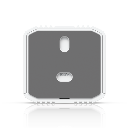Rear view of Ubiquiti UniFi Relay USL-Relay showing the mounting surface, keyhole slot and QR code