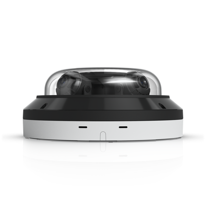 Rear profile of the Ubiquiti UVC-AI-MS-4 with mounting slots and camera lenses beneath the clear dome