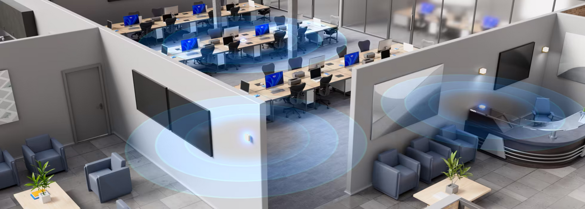 Office Wi-Fi coverage illustration for Ubiquiti UX7 UniFi Express 7, showing workspaces and reception areas.